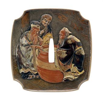 a_large_presentation_tsuba_signed_with_a_kao_and_dated_mannen_gan_kano_.jpg